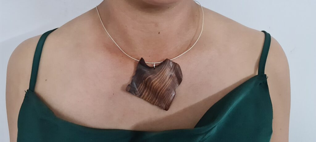 Purple Heart wood hand carved wave necklace
