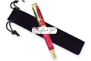 A black velvet drawstring pen pouch, designed for protecting woodturned pens.