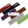 Una selección de coloridas fundas de fibra para bolígrafos en gris, rojo, café, morado y negro, diseñadas para bolígrafos de madera hechos a mano.