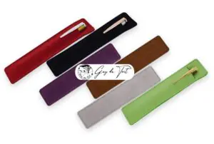 A selection of colorful fibre pen sleeves in grey, red, coffee, purple and black, designed for handmade wooden pens.