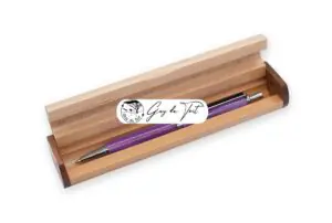 A maple wooden pen box with dark side panels, designed for a single handcrafted pen.