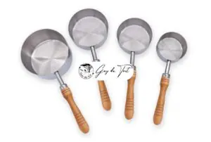 Stainless steel measuring cup kits with the round handle for woodturning.