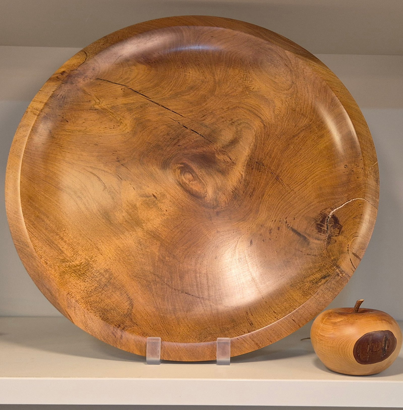 view of handcrafted swamp kauri platter with natural golden grain