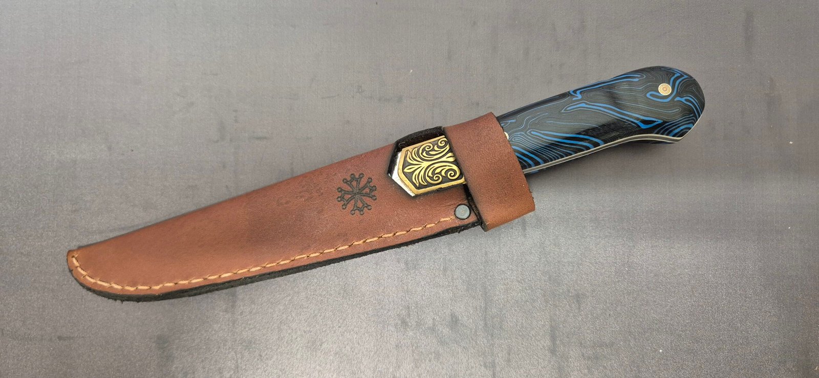 handcrafted G10 utility knife with custom Occitan sheath