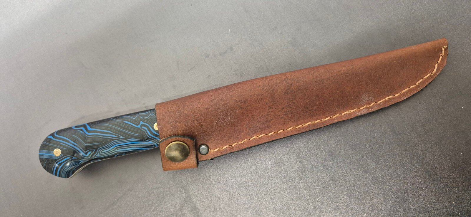 handcrafted G10 utility knife with custom Occitan sheath