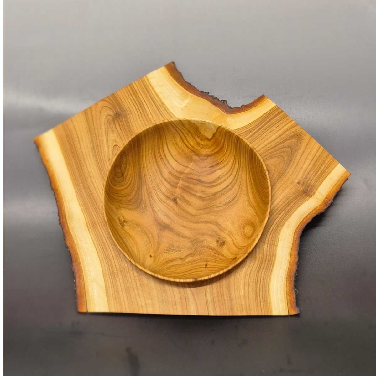 Winged cherry crotch bowl handcrafted by French woodturner Guy du Toit