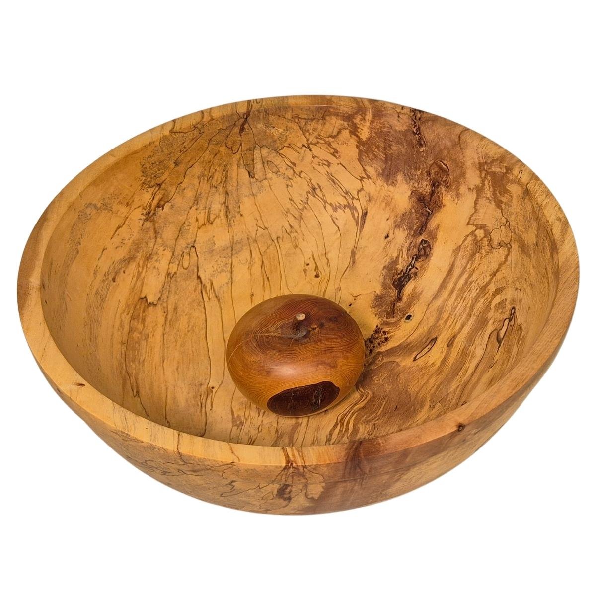 Appel inside Salad Bowl for scale